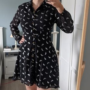 Cocktail dress with silver feathers